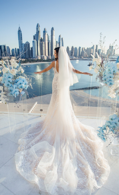 Bride Against the Backdrop of Dubai Skyscrapers
